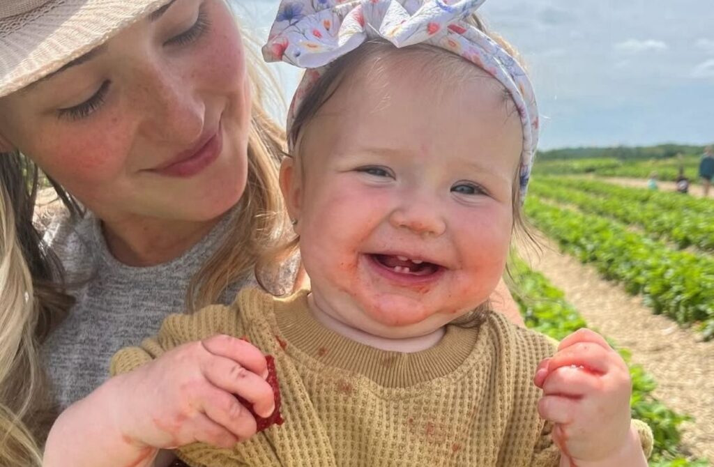The joy of picking your own strawberries. Photo courtesy of Linvilla Orchards.