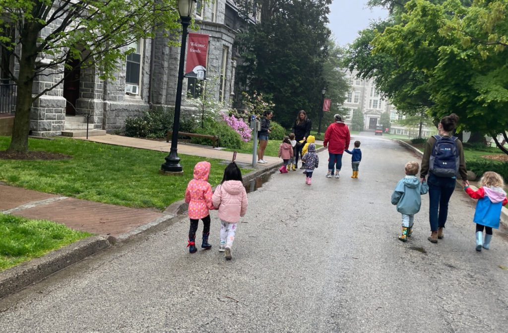 children walking on a college campus