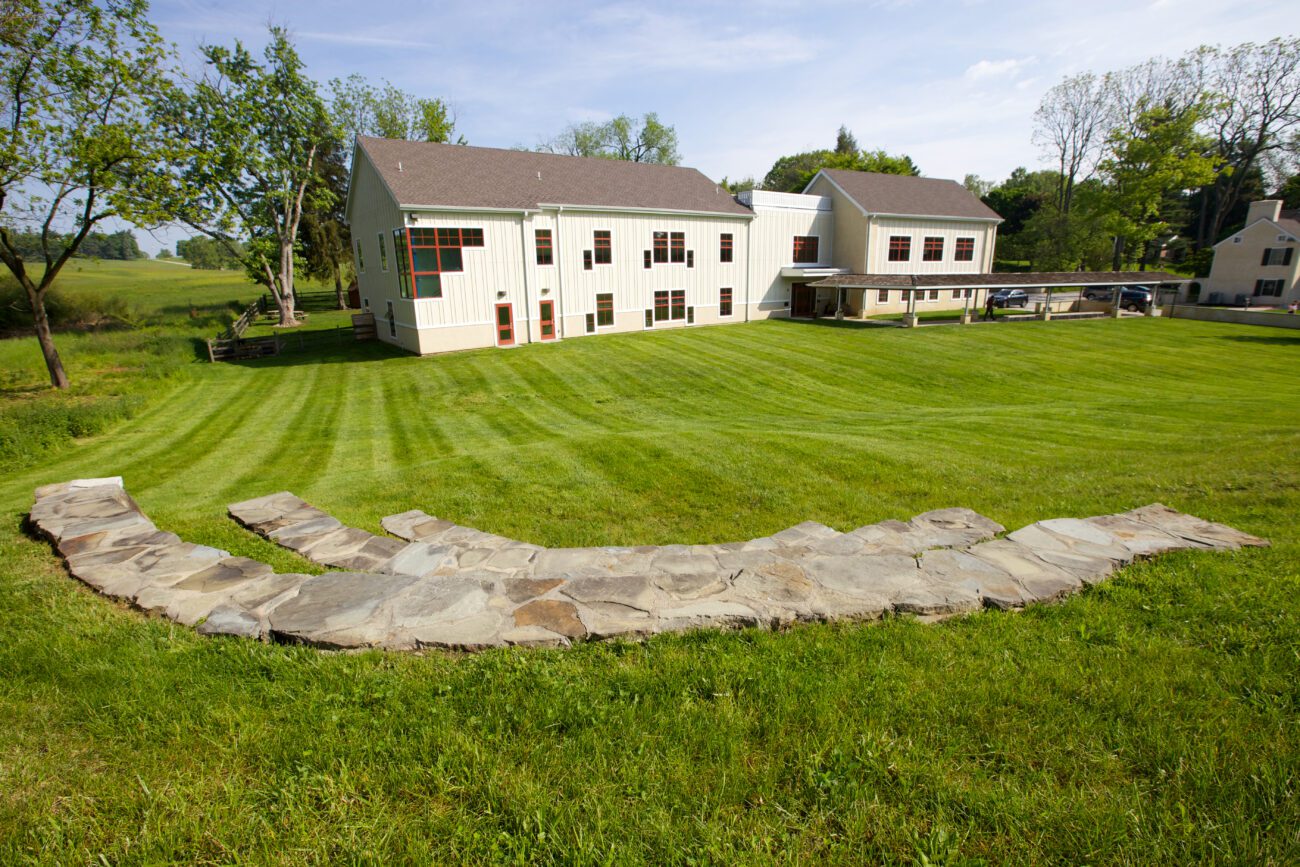School building and large yard.