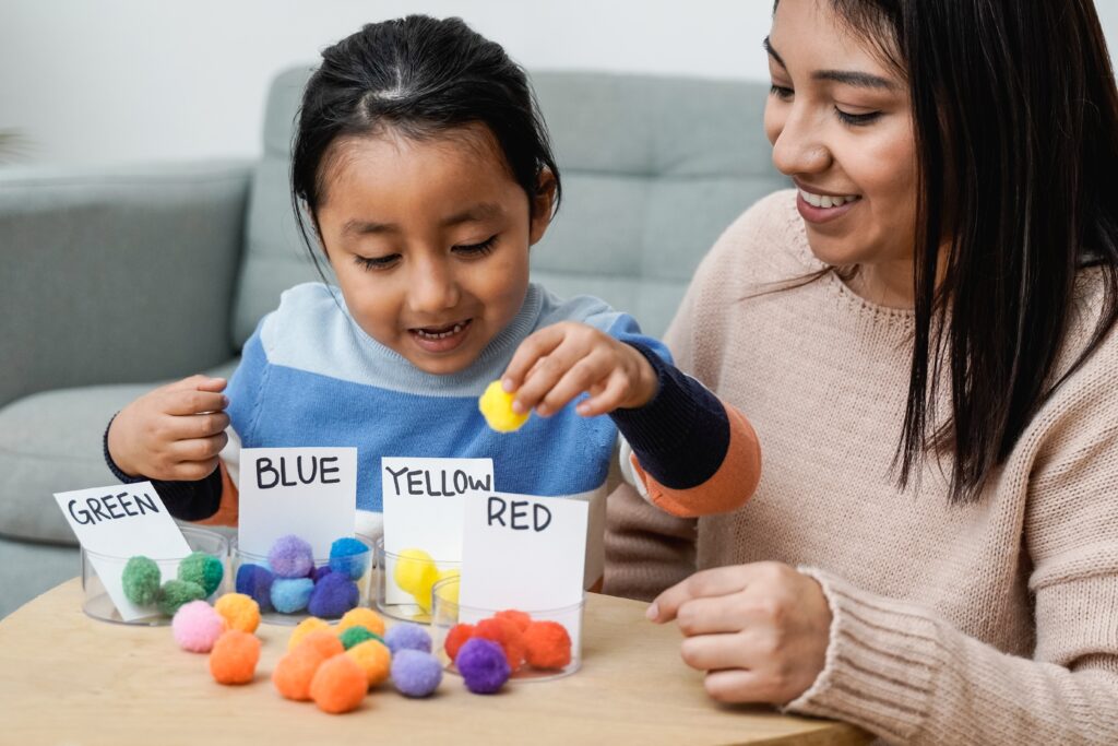 Asian,Kid,Playing,Didactic,Game,With,His,Mom,At,Home