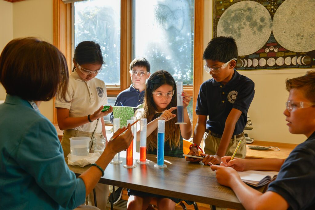 students conducting a science experiment at mlca