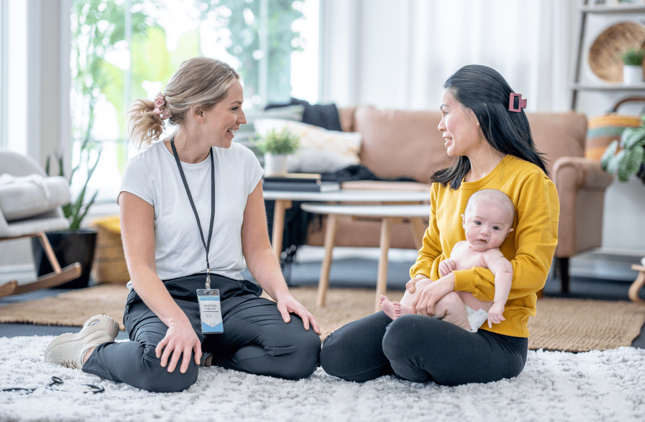 mother and baby talking with a therapist
