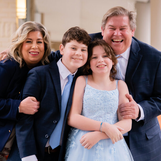 Mother, Father,, son and daughter at b'nai mitzvah, portrait