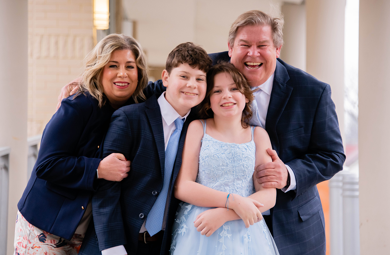 Mother, Father,, son and daughter at b'nai mitzvah, portrait