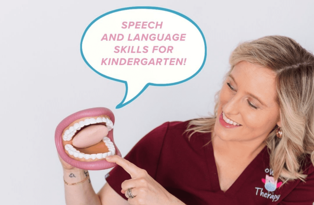 A speech therapist is using a puppet shaped like a mouth with teeth and a tongue to showcase speech skills