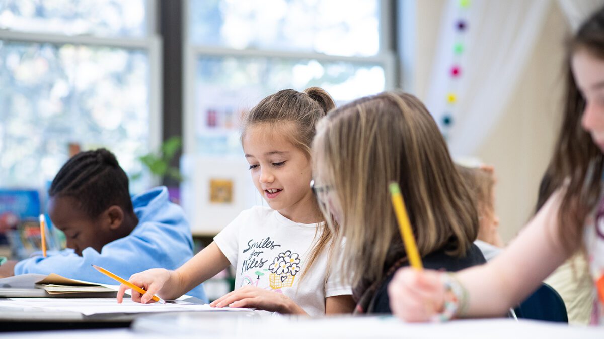 students doing math together in a classroom