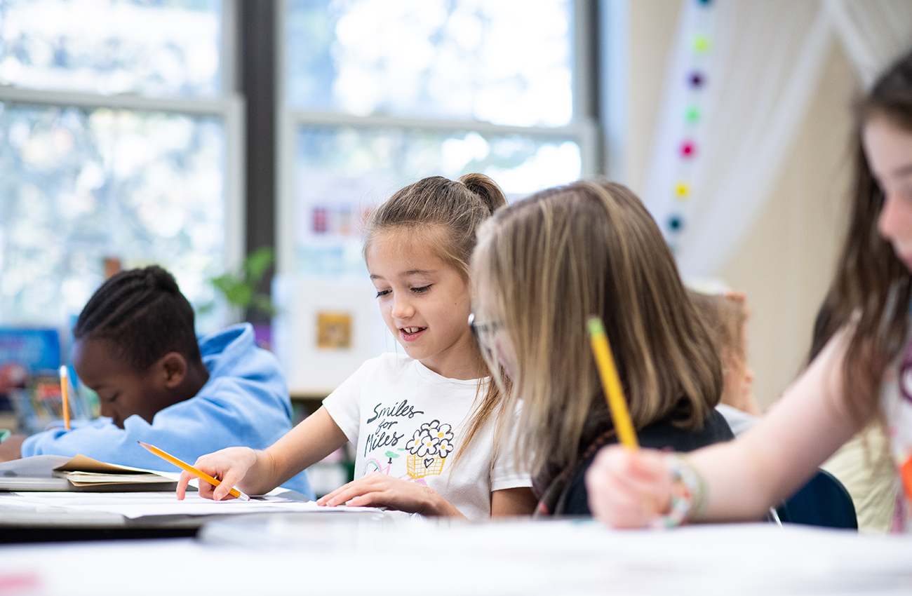 students doing math together in a classroom