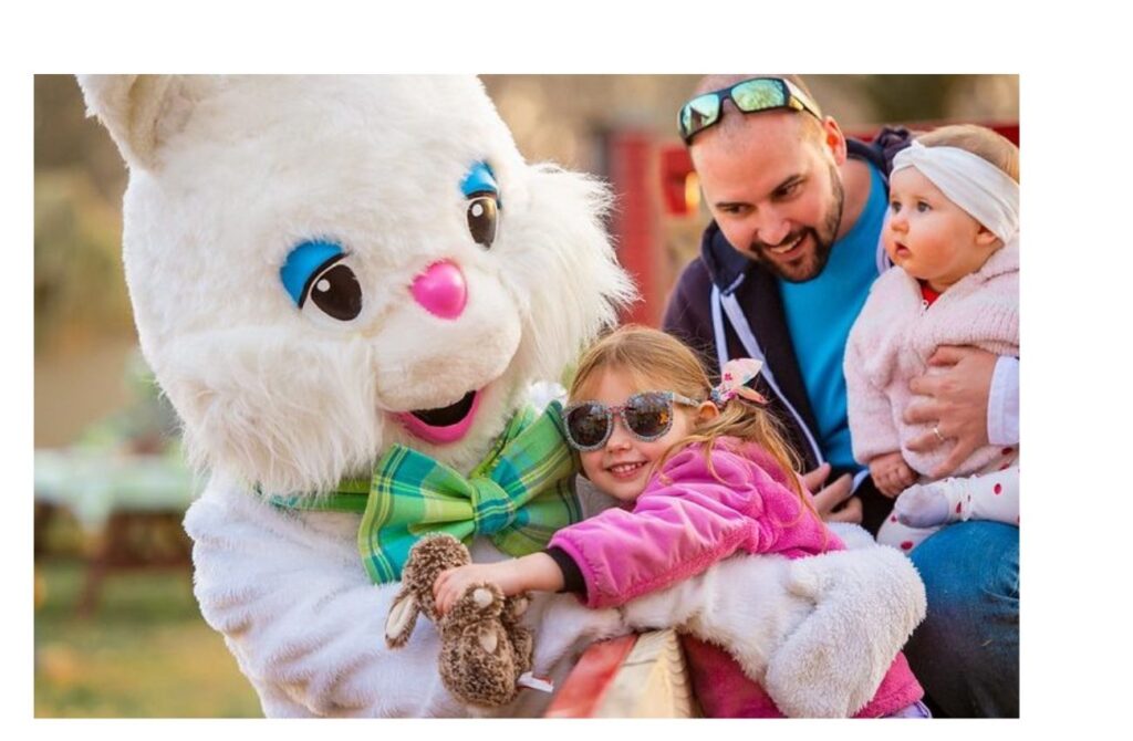 Main Line Easter Bunny at Linvilla Orchards hugging children