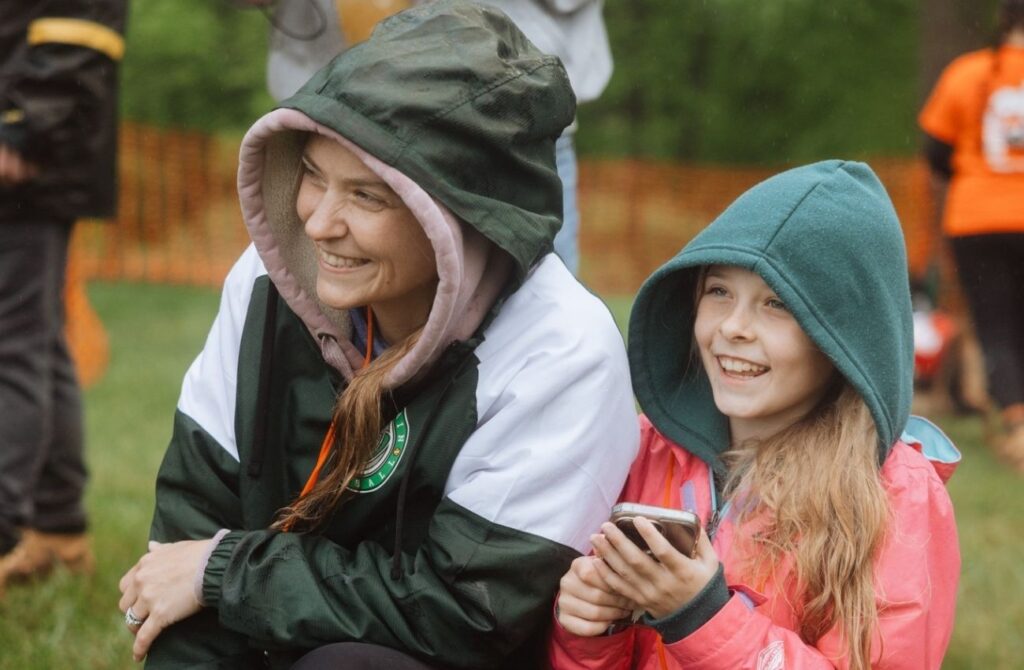 A mother and daughter with hoods up enjoy the Pottstown event.