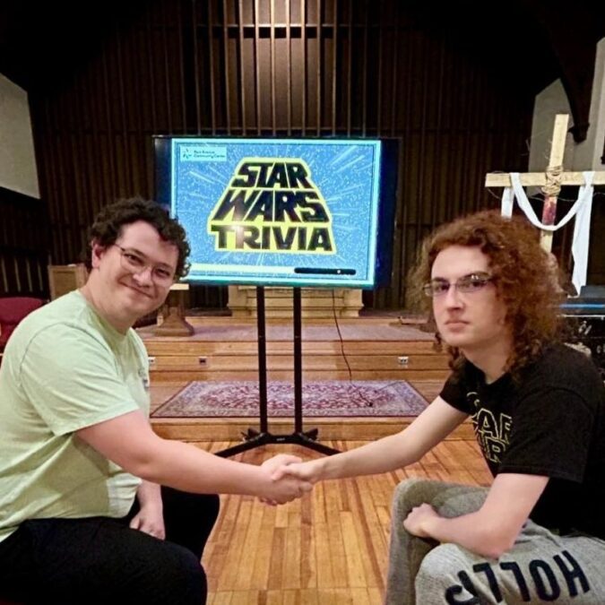 Two teenage boys play Star Wars Trivia at the Creative Living Room in Swarthmore.