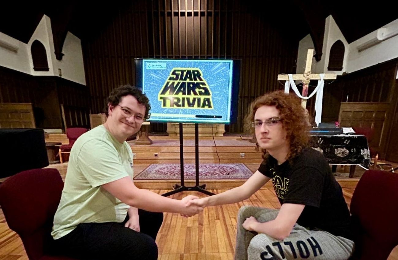 Two teenage boys play Star Wars Trivia at the Creative Living Room in Swarthmore.