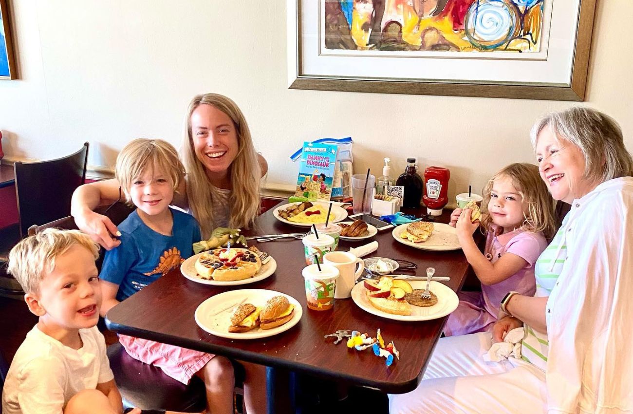 A mother, grandmother, and three little kids eat out for breakfast at Em J's Cafe in Berwyn.