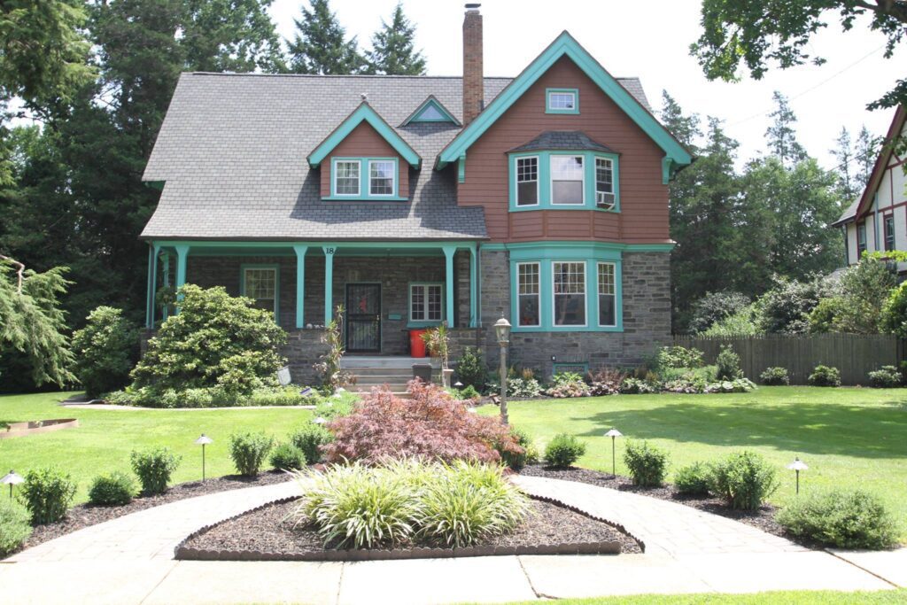 Exterior of a beautifully painted Main Line home, showcasing Artisan Painting’s high-quality craftsmanship and attention to detail.