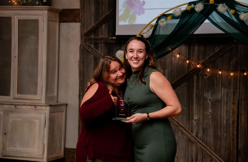 Karen Pecora is awarded as a Main Line Woman of Influence at Terrain Devon on the Main Line.