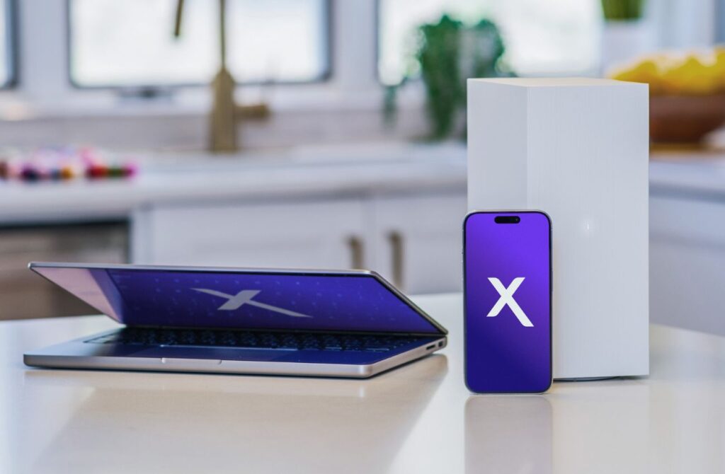 The Xfinity logo shows on a laptop and mobile phone. 