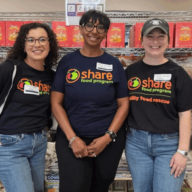 Share Food Program volunteers posing at one of their pantry locations