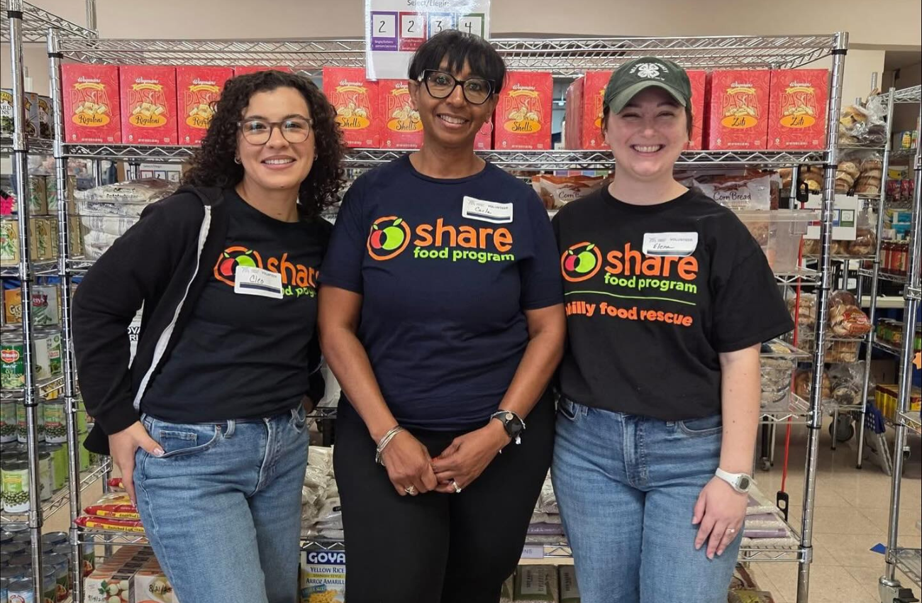 Share Food Program volunteers posing at one of their pantry locations