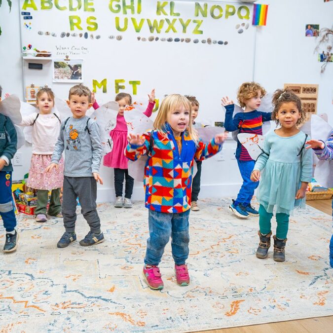 A group of little children on a classroom carpet in the Friends' Central Lower School