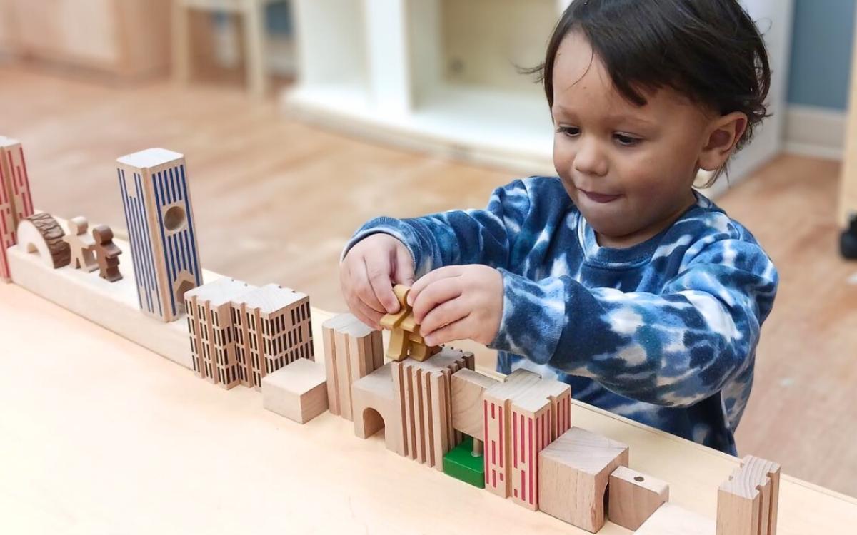 ivybrook bala slider-girl playing with blocks