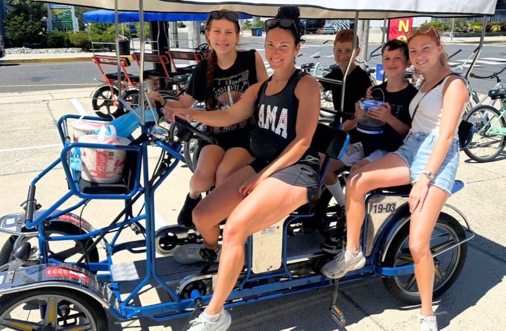 A family sits in a surrey bike in Ocean City, NJ. 