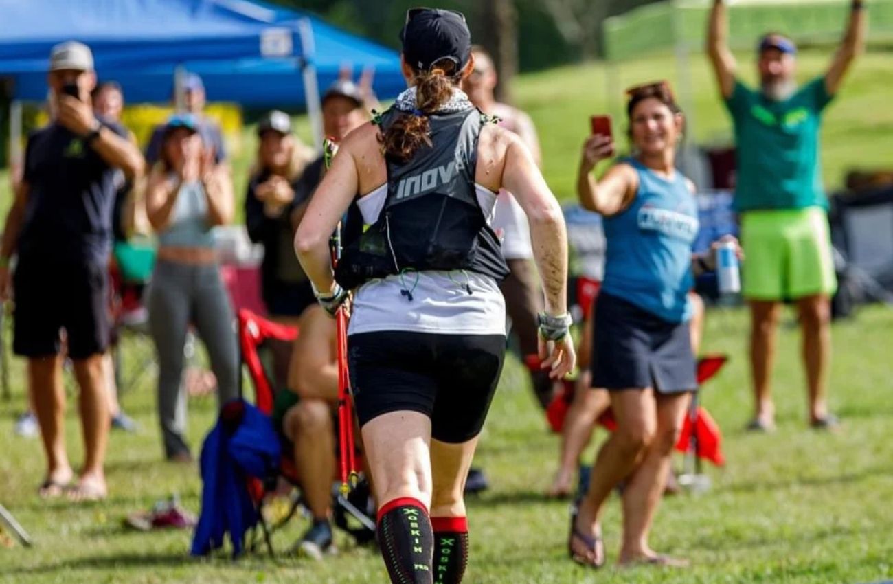 Kat Bright Main Line fitness trainer finishing race.